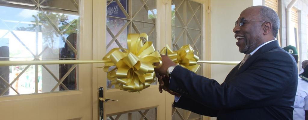 #htmlcaption-1 PM Rugunda at the handover ceremony of the Immigration Training Academy from IOM to GOU in Nakasongola